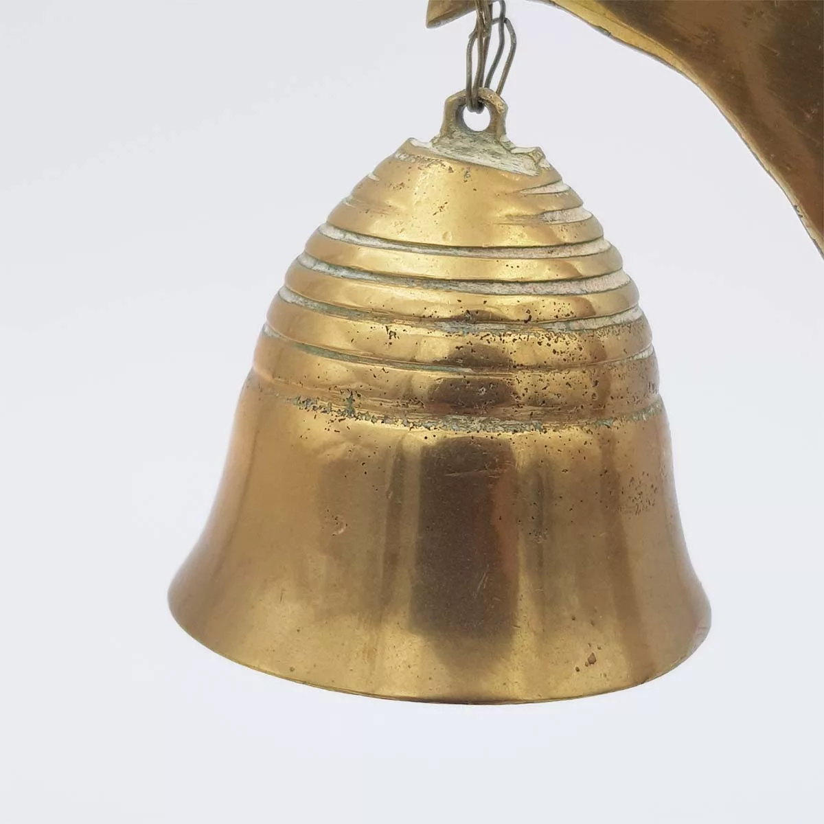 Brass chimes and mallet table bell decoration of a bird