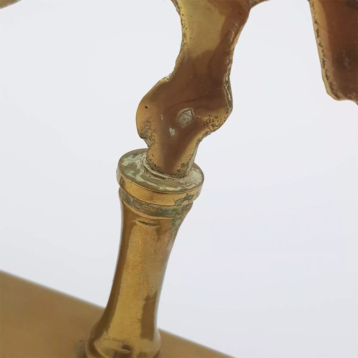 Brass chimes and mallet table bell decoration of a bird