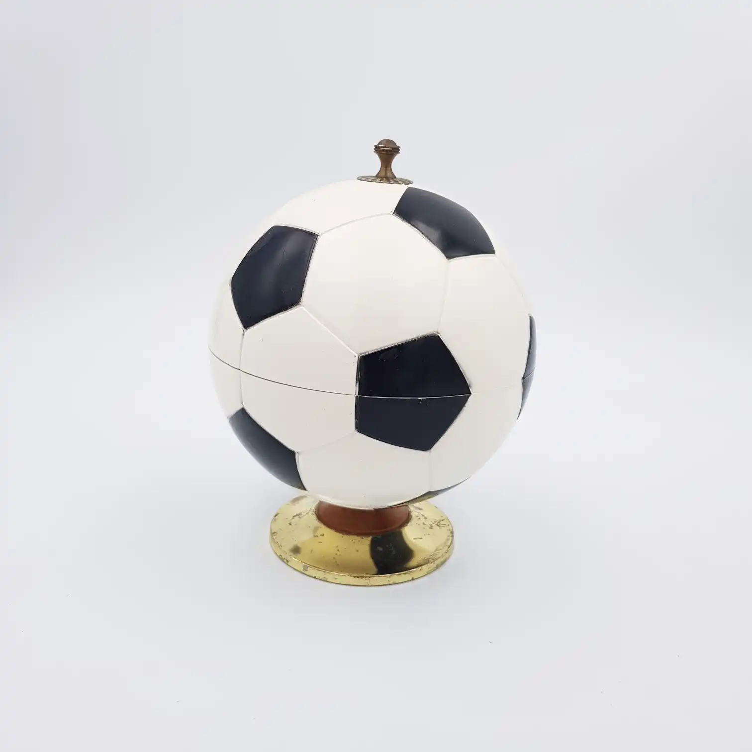 Vintage cigarettes dispenser cigarettes box in the shape of a soccer ball