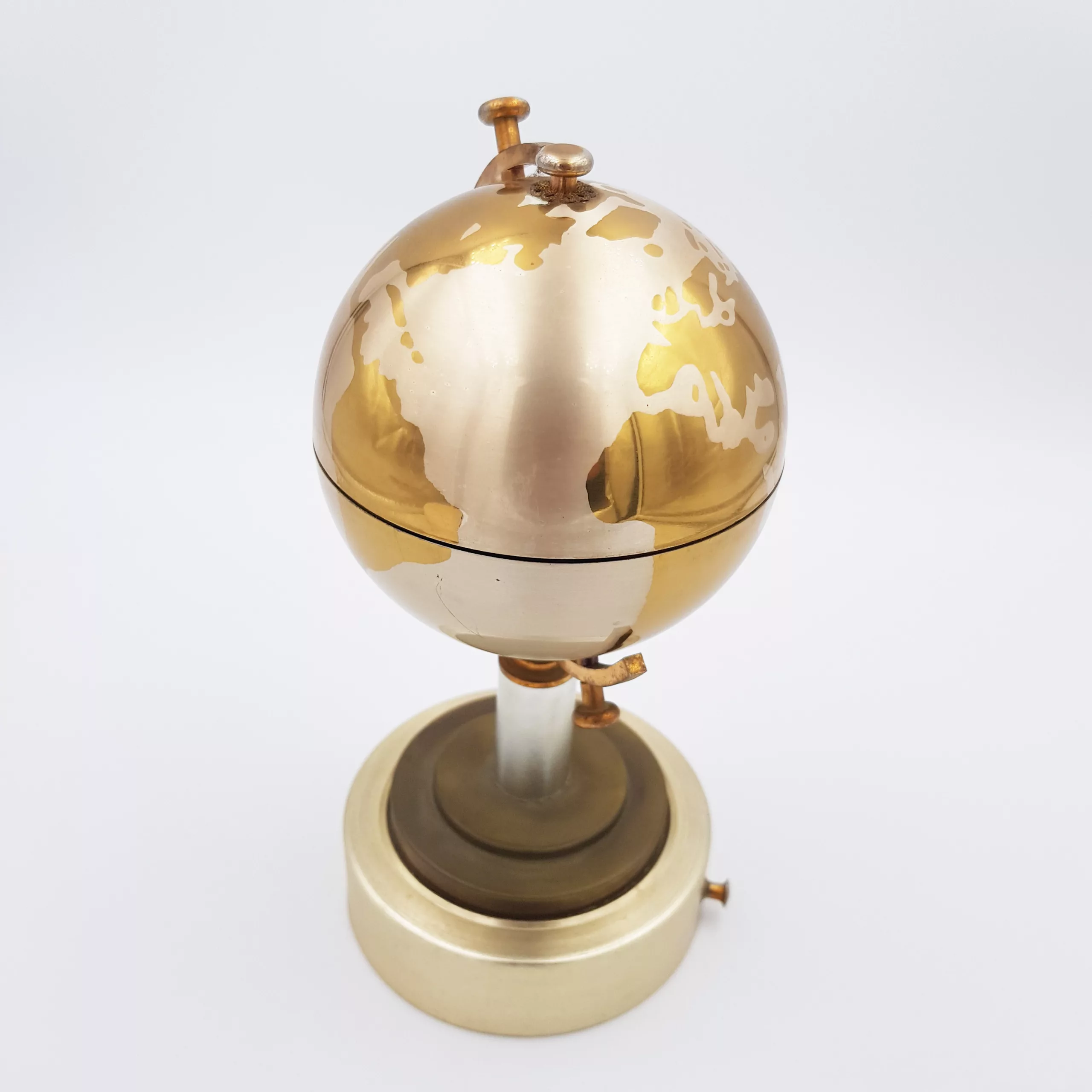 Vintage cigarettes dispenser shape of a small earth globe