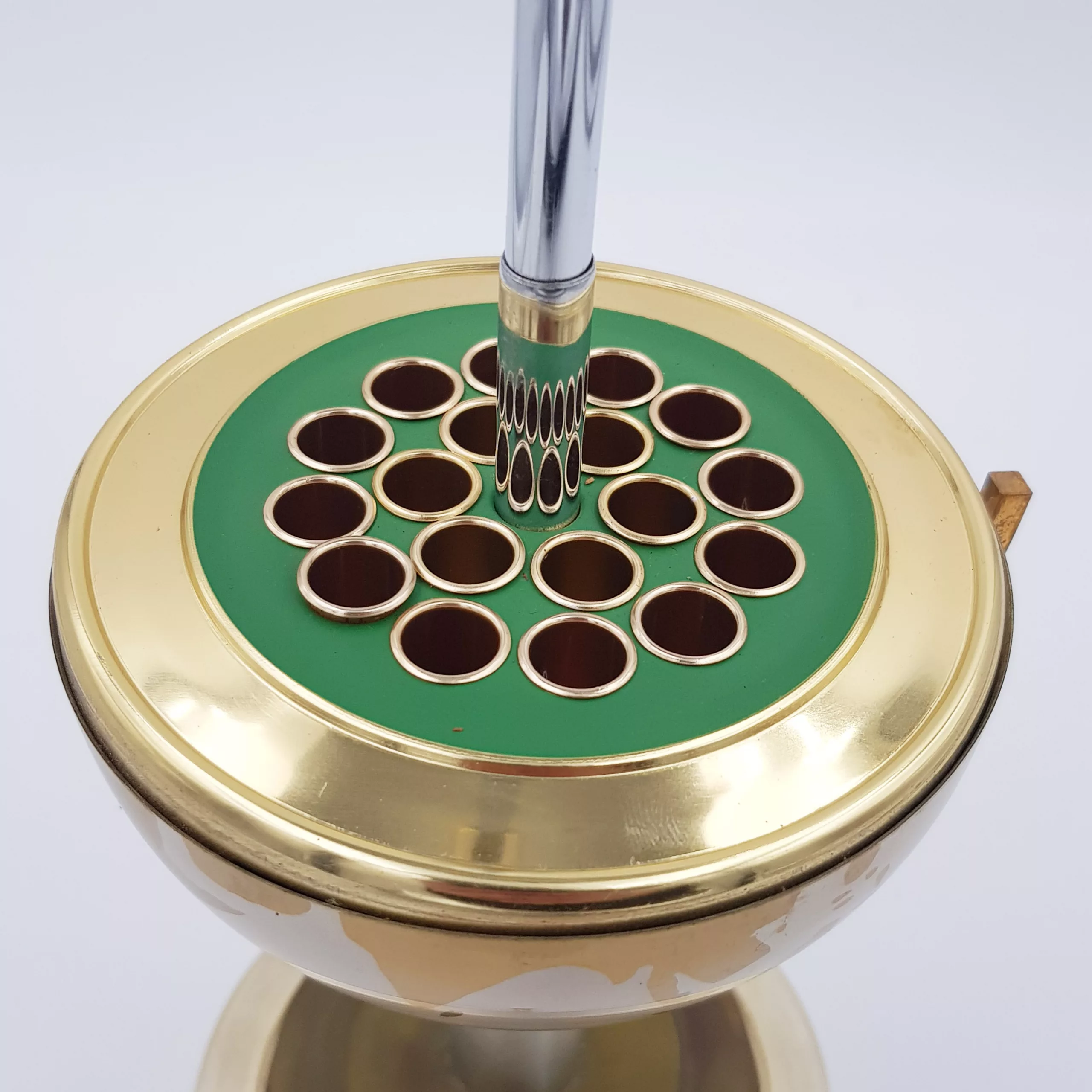 Vintage cigarettes dispenser shape of a small earth globe