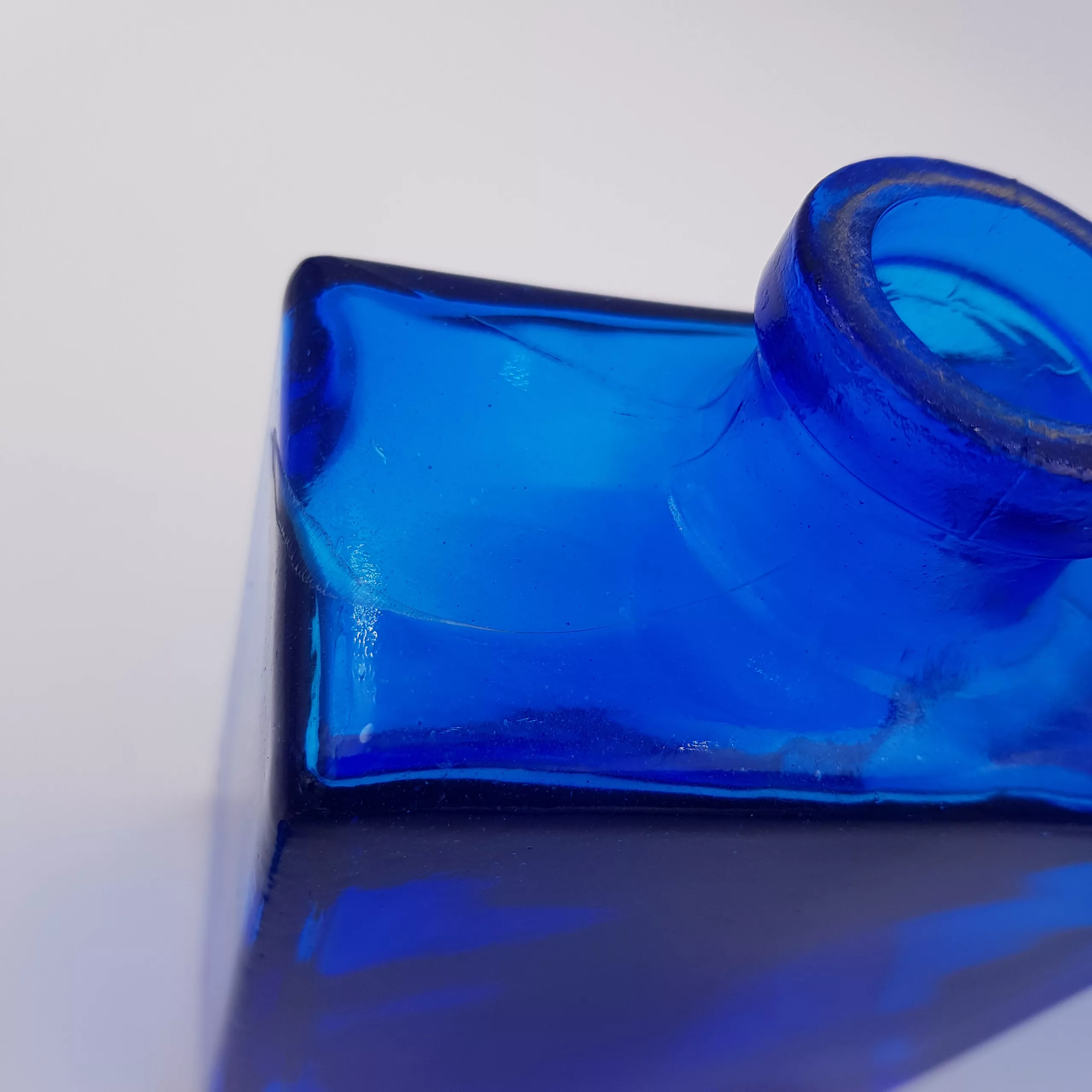 2 vintage cobalt blue glass flasks