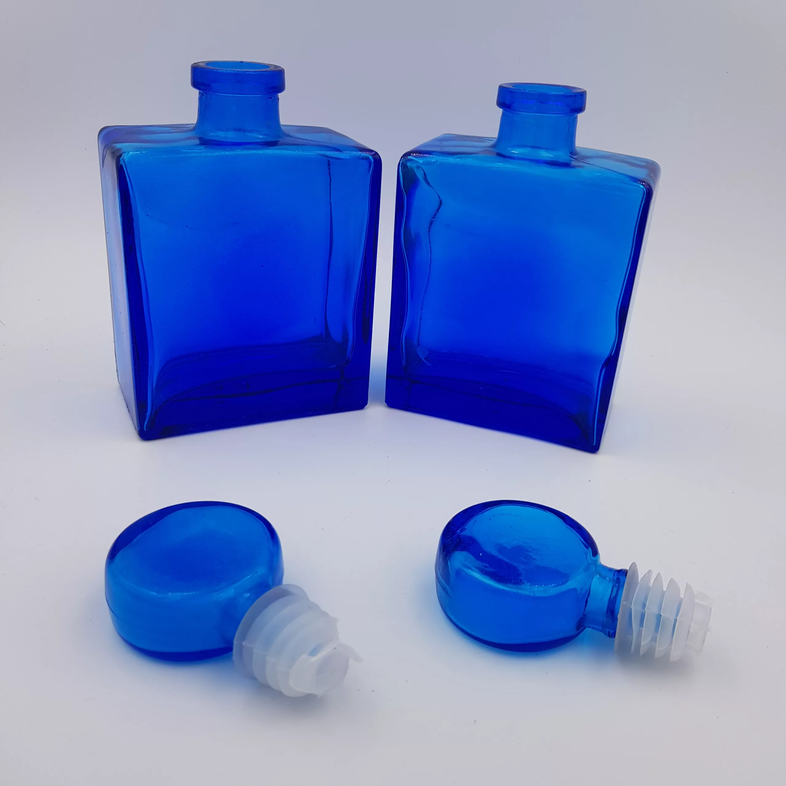2 vintage cobalt blue glass flasks
