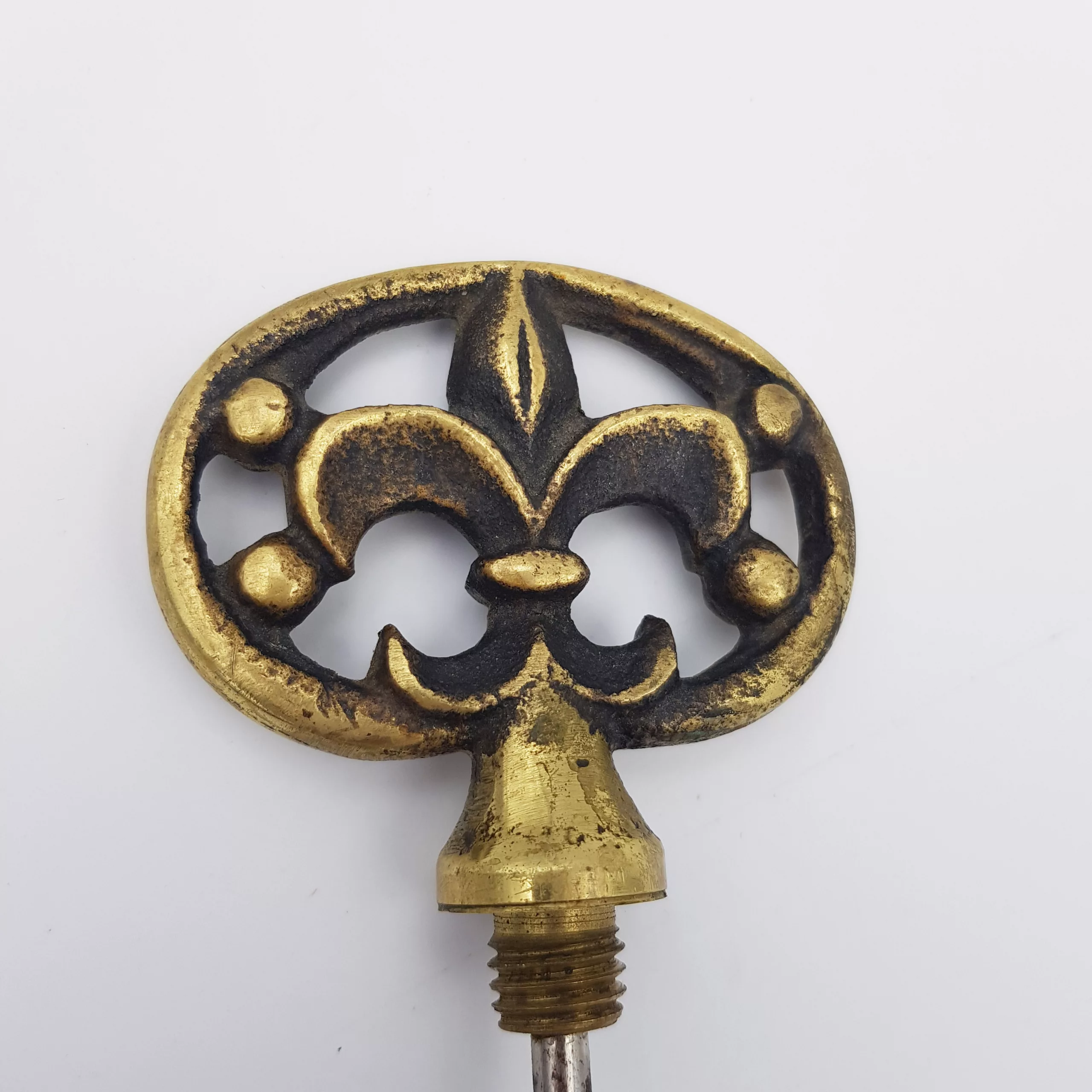 Vintage brass corkscrew shape of a giant key