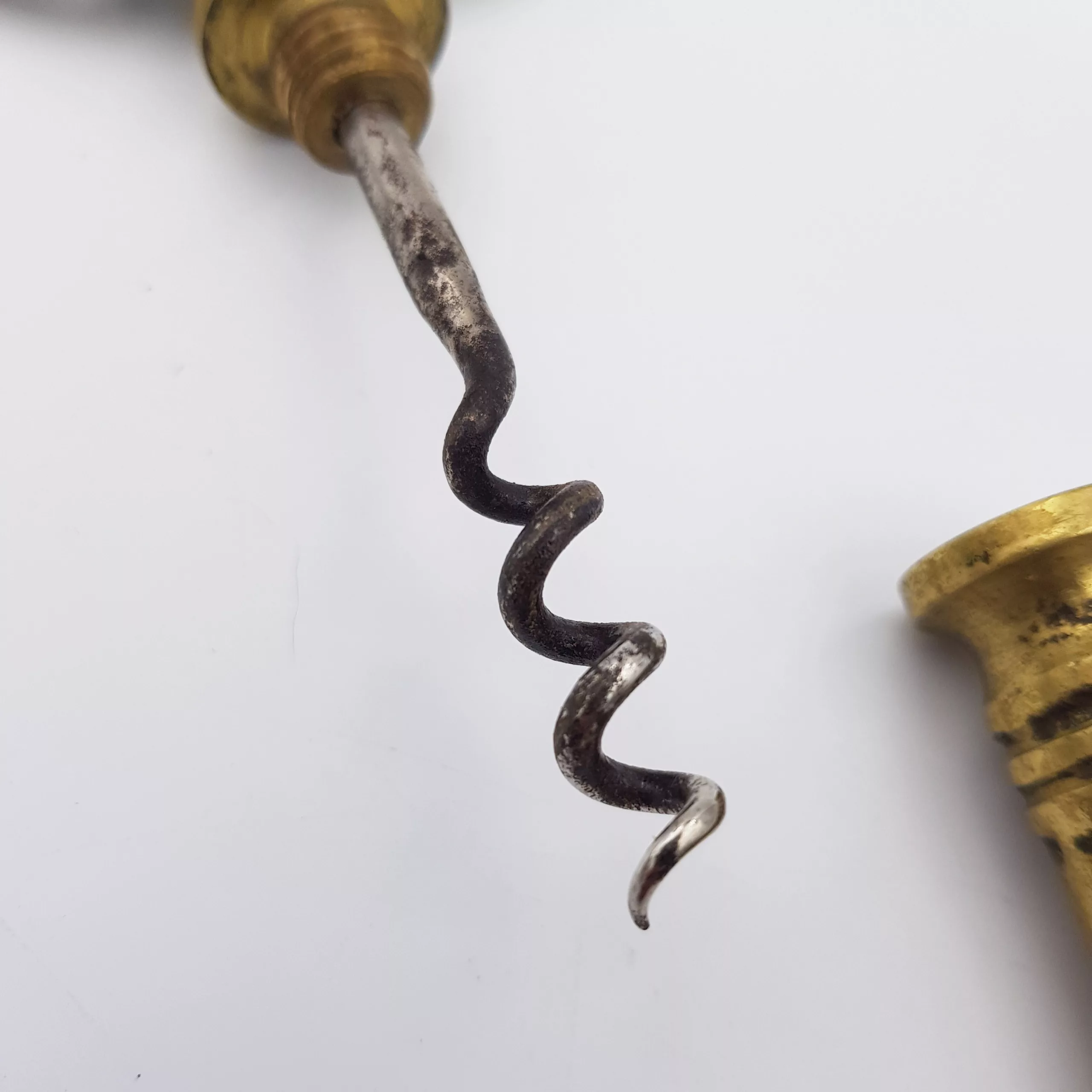 Vintage brass corkscrew shape of a giant key