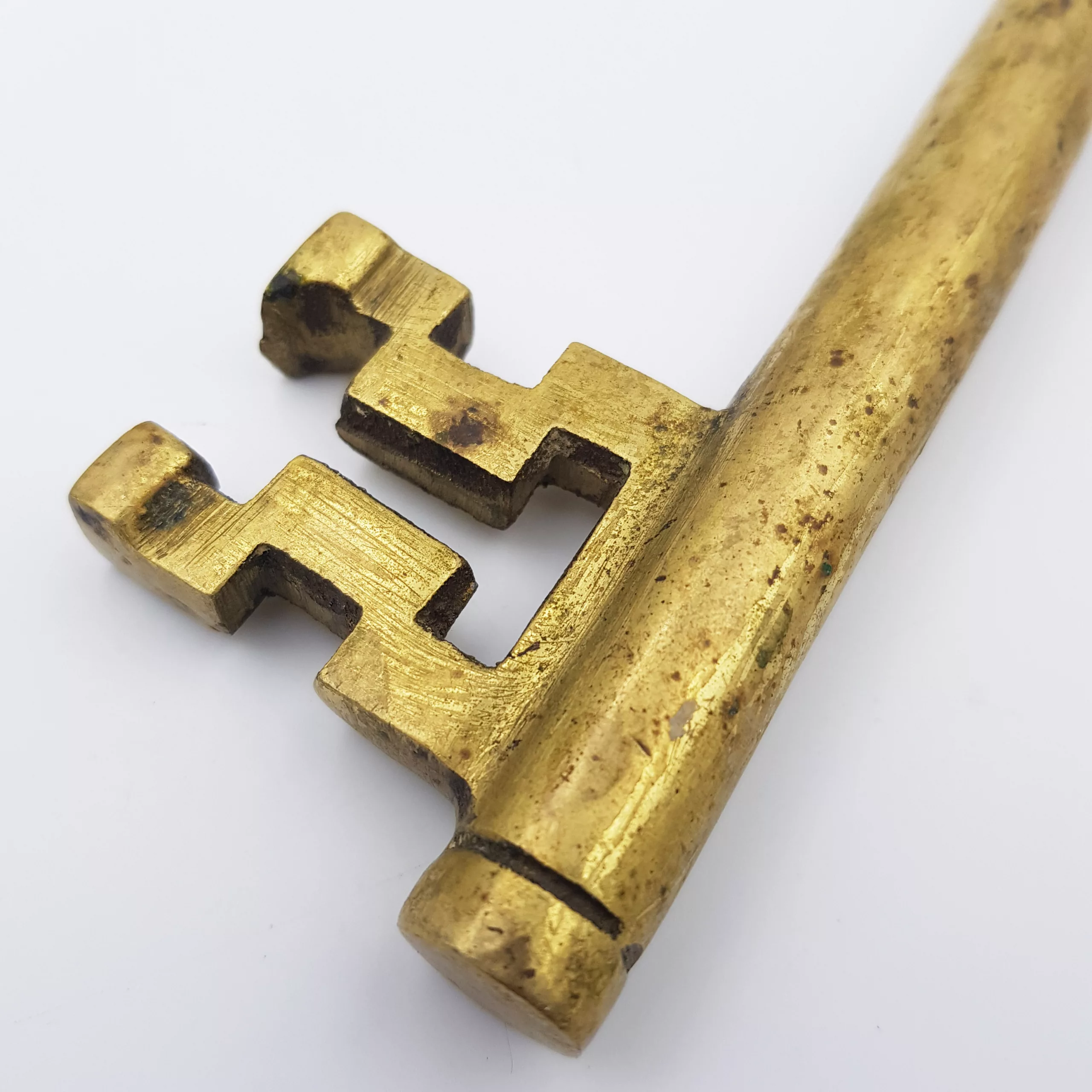 Vintage brass corkscrew shape of a giant key