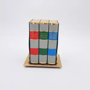 vintage cigarettes dispenser in the shape of 3 antique books